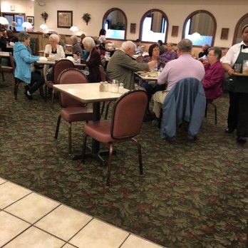 Regulars enjoying lunch in the C&H Cafeteria dining room